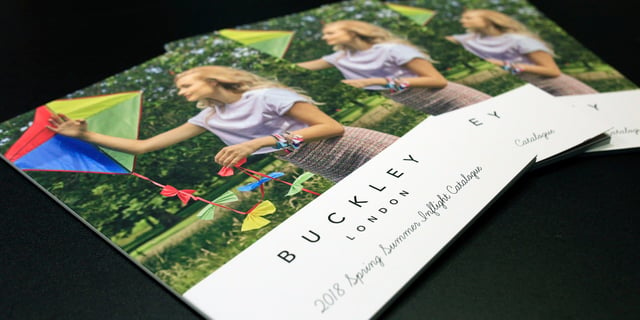Buckley London brochures on table