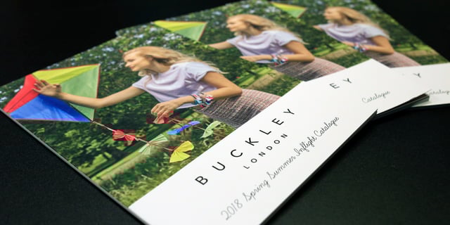 Buckley London brochures on table Buckley London brochures on table